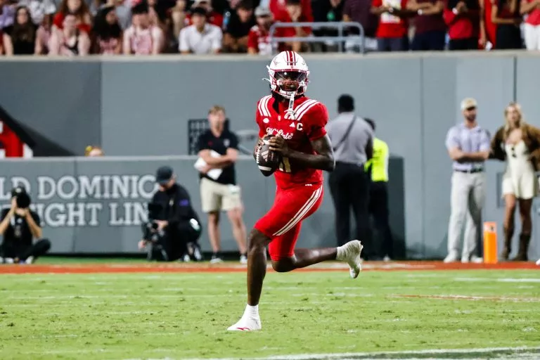 CJ bailey looks to lead the Wolfpack over the Cavaliers
