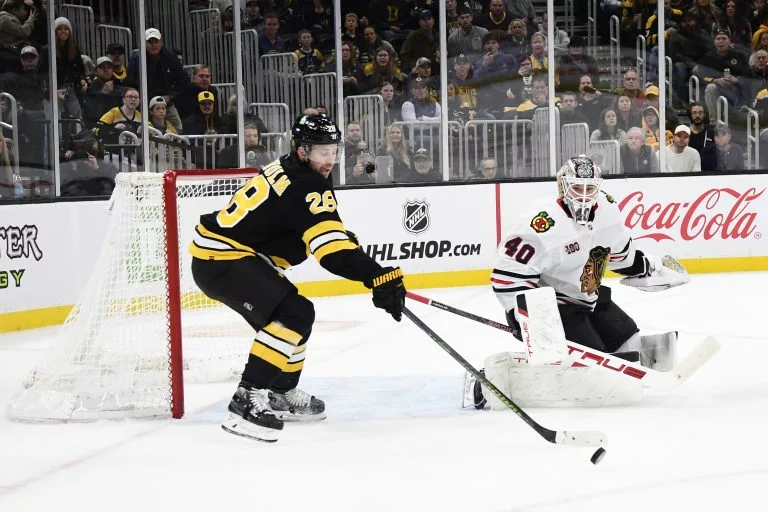 Elias Lindholm looks to lead the Bruins over the Hurricanes