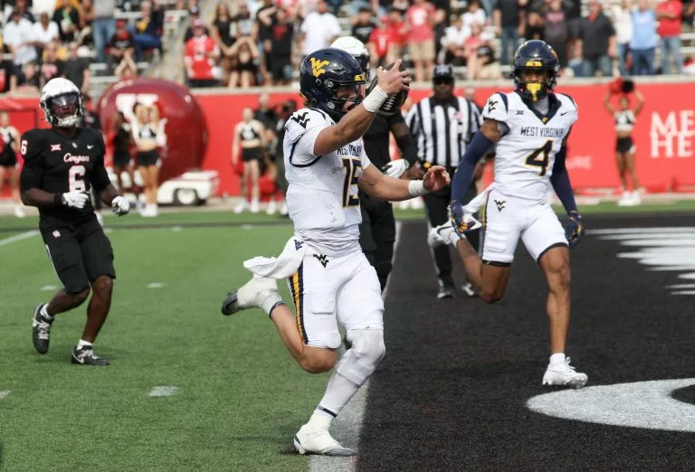 Scotty Fox Jr. looks to to lead the Mountaineers over the Buffaloes